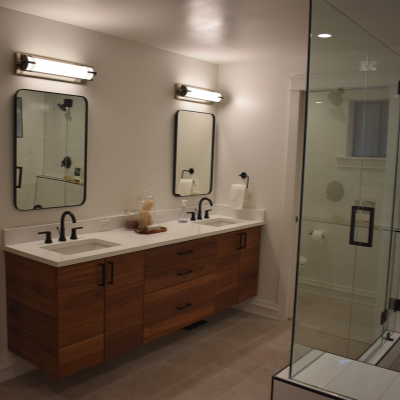 Bathroom remodel with vanity lights, recessed can lights, and receptacle outlets in Tigard by Classic Electric